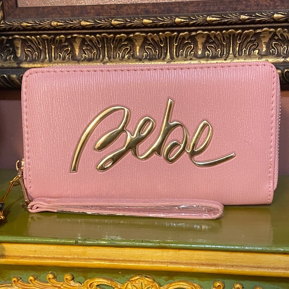 bebe Handbags - Bebe NWT Gianna Wristlet Wallet Blush Wallet with Gold Logo 7.5x4x1